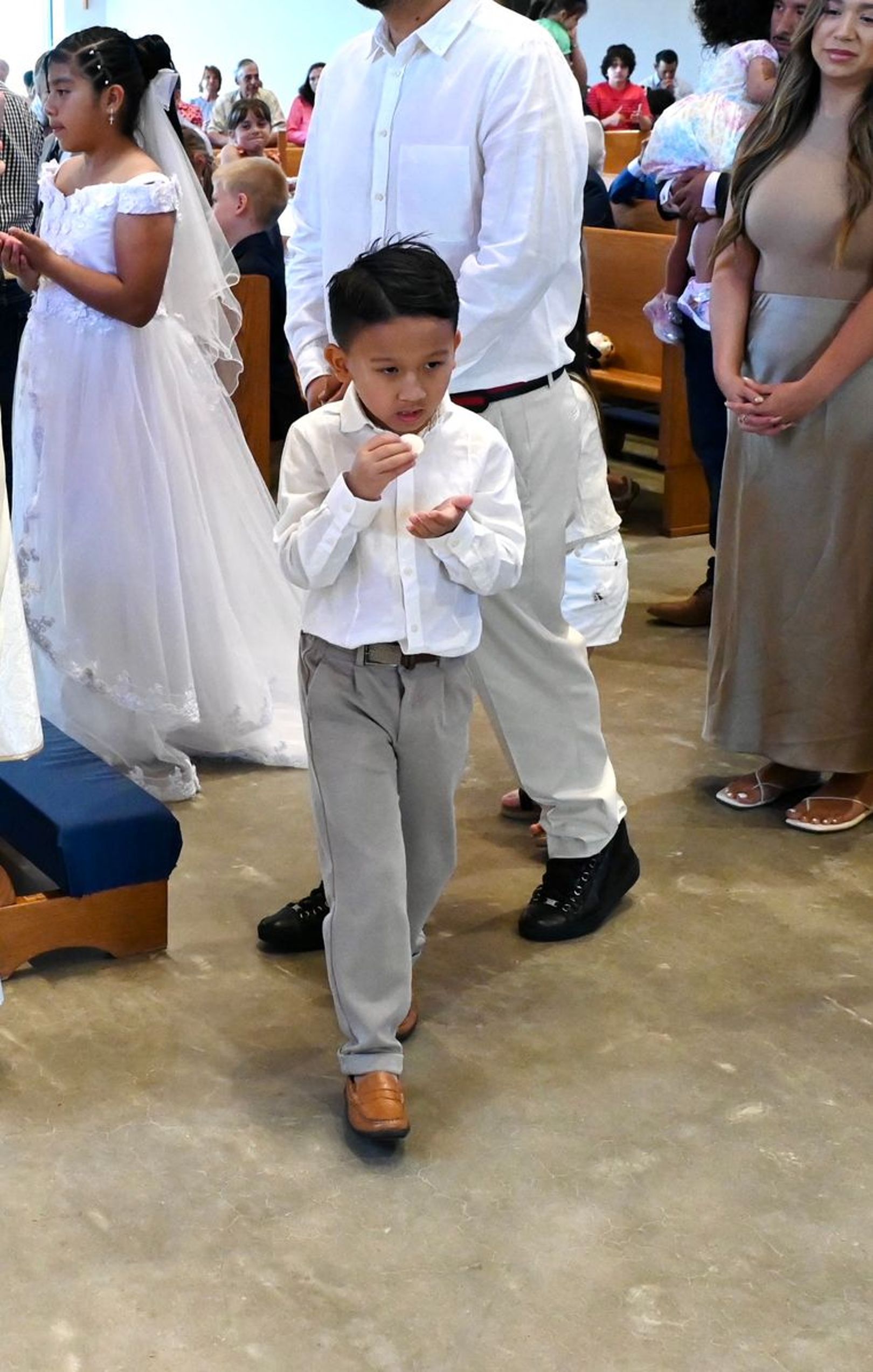 2025-04-05-first-communion-mass-0585.jpg