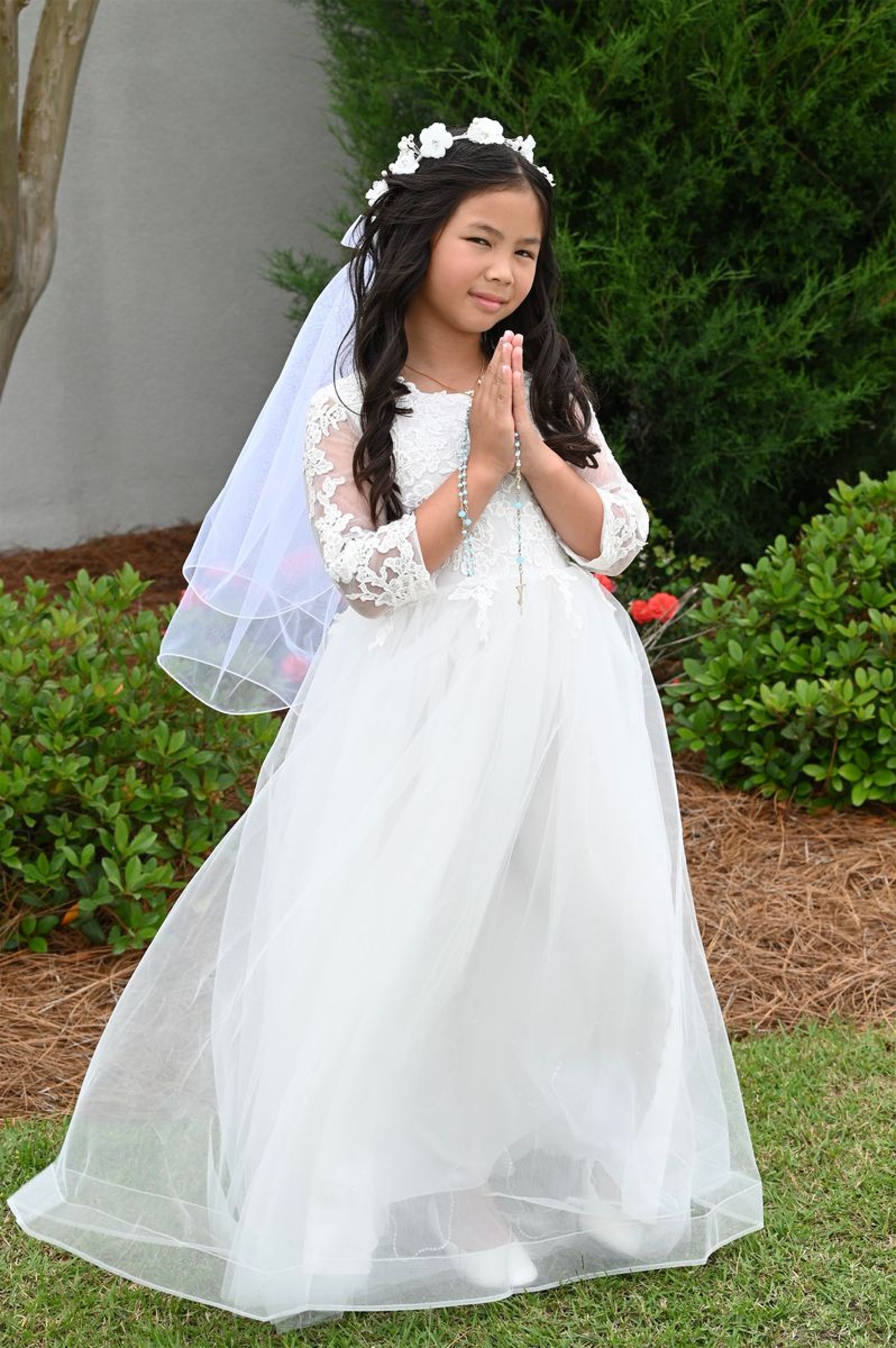 2025-04-05-first-communion-mass-0097.jpg